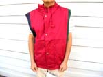 China manufactured outer wear wholesale outsoucing agent. Mens rain wear vest with zippered front covered by button up lapel