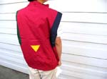 China manufactured outer wear wholesale outsoucing agent. Mens rain wear vest with zippered front covered by button up lapel