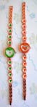 Jewelry fashion distribution outsourcing company. Heart designed womens watch with colored enamel on copper colored chain