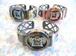 Ladies jewelry accessory B2B agency exports fashionable crisscross cut-out bangle bracelet band holding unique designed clock face frame inlaid with cz rhinestones