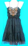 China B2B trade agency supplies fine fashion clothing. Beautiful black Spanish style dress with decoratively beaded top and midi length skirt