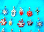 Rhinestone charms imported at wholesale price. Gorgeous silver pendants in fun designs inlaid with colored cz crystals