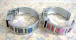 Fun ladies accessory online B2B trade supplier. Bangle bracelet watch with sparkly enamel on side of band and silver plated frame with butterfly design on clock face