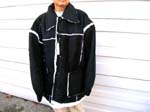 Wholesale fashion jecket supply export company. Mens winter coat in navy blue with white fleecy inside and seams. Large collar for warmth, side pockets, and button up