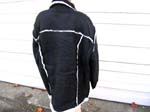 Wholesale fashion jecket supply export company. Mens winter coat in navy blue with white fleecy inside and seams. Large collar for warmth, side pockets, and button up