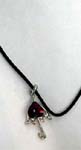 Cz wholesaler distributing pendant jewlry online. Silver plated, umbrella shaped pendant with clear imitation diamonds on bottom edge of umbrella and large ruby red cz gem in center.