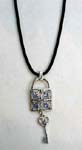 Export outsourcing cz jewelry wholesaler sells Lock and key theme pendant with blue cz gemstones inlaid in intricately designed lock and in heart shaped key hanging below
