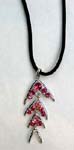 Gemstone jewelry manufacturing import agent wholesales made in China products. Silver plated Four tiered arrow design pendant with pink cz crystals set below three levels