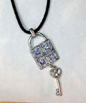 nline fashion apparel jewelry China wholesaler supplies Silver plated lock and key pendant necklace with light purple cz gems embedded in the center of lock and in heart shaped key hanging below
