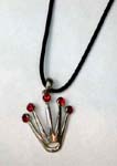 Online China jewelry export agent distributes wholesale cz pendants. Silver plated crown shaped pendant with ruby red cz gemstones at each point hanging from black cord necklace 