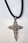 Religion cz fashion jewelry wholesaler supplies to retail shops. Crucifix shaped religious pendant with purple cz gems inlaid in intricate vine pattern and amber cz crystals embedded in small cross at center