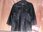 Replica leather outer wear international wholesale company distributing *Faux black suede mid length black coat with black roll up cuffs and brown imitation fur collar