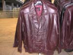Online China factory agent supplies replica leather outer wear. Double collared imitation leather jacket with classic seamed lining, button up flap covered zipper and elastic waist