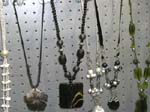 Unique China manufactured accessory jewelry warehouse exports womens fashion. Large pendant hanging on beaded and shell necklace