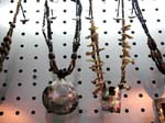 Beach seashell necklace fashion warehouse distributes womens accesory jewelry at discount cost. Beautiful beaded and shell necklace with large pendant hanging on bottom