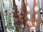 Wholesale necklace jewelry shopping market from online womens wear warehouse. Shell necklace in different colors attached to beaded necklace