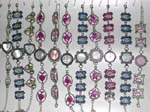 China watch export factory supplies unique gifts. Silver chained watch has beautiful enamel designs to form chain and lovely silver framed clock
