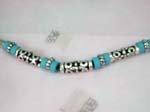 Wholesale fashion home jewelry page for international distributors. Silver necklace with solid pole chain attached with light blue beads. Center of necklace has three long silver designed beads interconnected with light blue beads