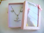 Online cz stone jewelry set wholesaler supplier distributing Fashion jewelry box set, silver plated necklace, studs earring and ring with 2 parallel line holding a cz design. Spring ring clasp 