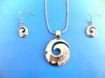 Diamond cz jewelry imported and sold wholesale to retail outlets. Spiral charm cz jewelry set includes an exquisite snake chain necklace with a set of fish hook earrings
