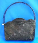 Discount replica handbag disttributed by purse wholesale company. black beaded handbag with diagonal line design, multi wavy shape on top in black long beads and thread work, also 4 beads strings forming in single handle design 