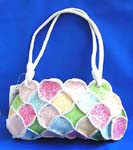 Designer inspired purse exported wholesale from China manufacturer. Imitation white leather hand bag motif multi circle leather chips connected together with carved-in smoked floral, also one pocket inside and double shoulder design