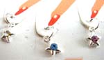 nail decor art supplies distributed by China import agents. Star shape finger nail art charms with inlaid colored gem