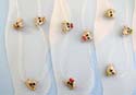 Fashion anklet with clear band and assorted mini cz design, motif in cow head pattern