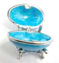 An egg shape metal jewelry box with blue double heart pattern enema in blue color, magnet lock design, including a gold color box to wrap it up 