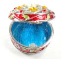 Round enamel jewelry box motif filigree flower holding 5 orange shiny beads and a pearl bead inlaid on lid with pinky flower decor around, enamel in red color
