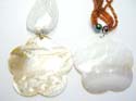 Assorted multi bead strings necklace motif a flower shape seashell pendant