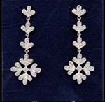Earring jewelry wholesale catalog for discount fashions. Three tiered petal inlaid with cz stones that hold large flower design also inlaid with clear cz stones