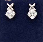Classic collection jewelry manufactured and designed with cz gemstones, sold for retail online. Large clear cz stone held by crossed over rhodium plated studs.