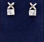 Women fashion supply store sells wholesale cz jewelry. Large cubed cz stones held by crossed over rhodium plated studs