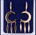 Rhinestone fashion jewelry supplier distributing online wholesale earrings. Simulated gold plated half moon earings held by elongated stud and three diamond shapes hanging below