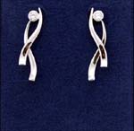 Fashion supply business imports wholesale cz jewelry. Cz stone studs with overlapping and curved rhodium plated lines