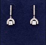 Crafted online wholesale jewelry supplies imported cz earrings. Rhodium plated earings inlaind with cz stones formed in an arch holds a large cubed cz chrystal.
