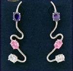 New wholesale jewelry fashions on sale for retail purchase. Curved rhodium plated poles holding pink, purple, and clear cz stone