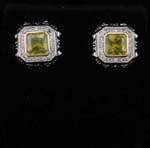 Pierced earring jewelry outlet supplies online cz gifts. Fashionable stud earings with small clea cz stones inlaid around a large yellow cz stone in center
