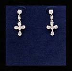 Religious fashion jewelry sold wholesale online from export distributors. Small cross held by stud that are embedded with clear cz stones