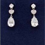 Vintage wholesale crystal jewelry inspirations supplied online by export agent. Danging imitation diamond earing with circular stud extending to heart shape and then large oval