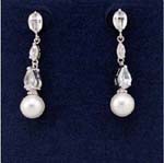 Wholesale China export fashion jewelry dealer supplying cz earrings online. Three cz stones; one in circle, diamond, and oval shapes that suspend an imitation pearl.