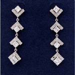 Special presents from online jewelry supply company selling wholesale earrings. Four, suspended simulated diamonds with rhodium plated frame 