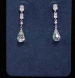 China wholesale jewelry supplies imported and distributed online. Simulated diamond rain drop hanging from rhodium plated and cz stone chain