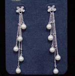 Wholesale direct manufacturers sell cz jewelry fashions for women. Fashionable earings with imitation pearls dangling from butterfly studs on rhodium plated chains