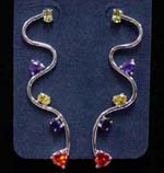 Cz jewelry sold online from distribution manufacturer. Curvy rhodium plated poles with yellow, purple, red, and blue cz stones attached to sides.