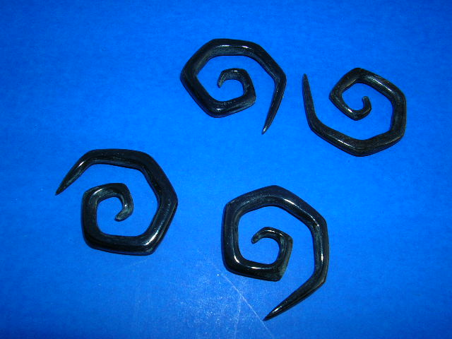 Squared edging on spiral organic horn earrings - international gift sourcing agent