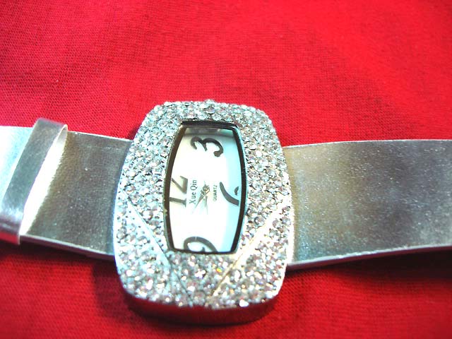 Wholesael Silver strap on ladies stone adorned watch online express