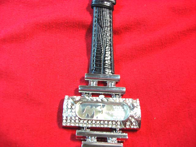 Direct wholesale jewelry - Stylish black imitation leather strap holding long rectangle clock face in silver with cz stones