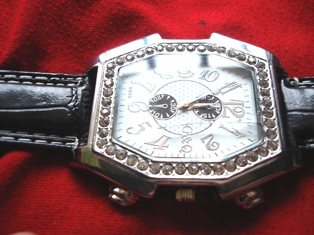 B2b trade jewelry collection - Octagon shaped clock frame with beaded edging on trendy black imitation leather strapped watch